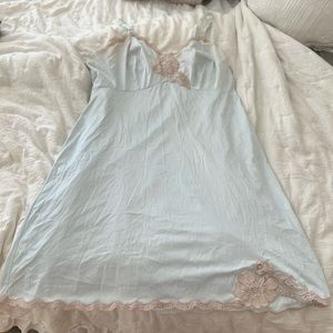 Vintage slip , light blue. Tag says “average 40” fits like a medium
